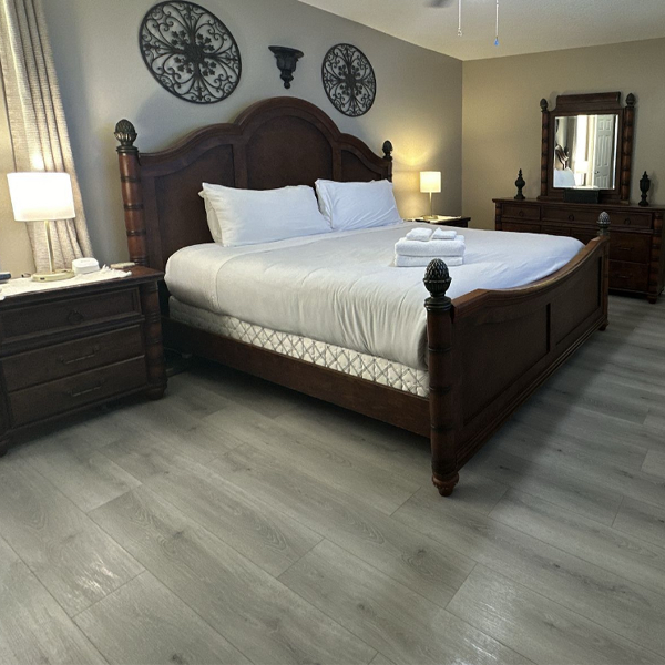 Living room with natural maple tone flooring